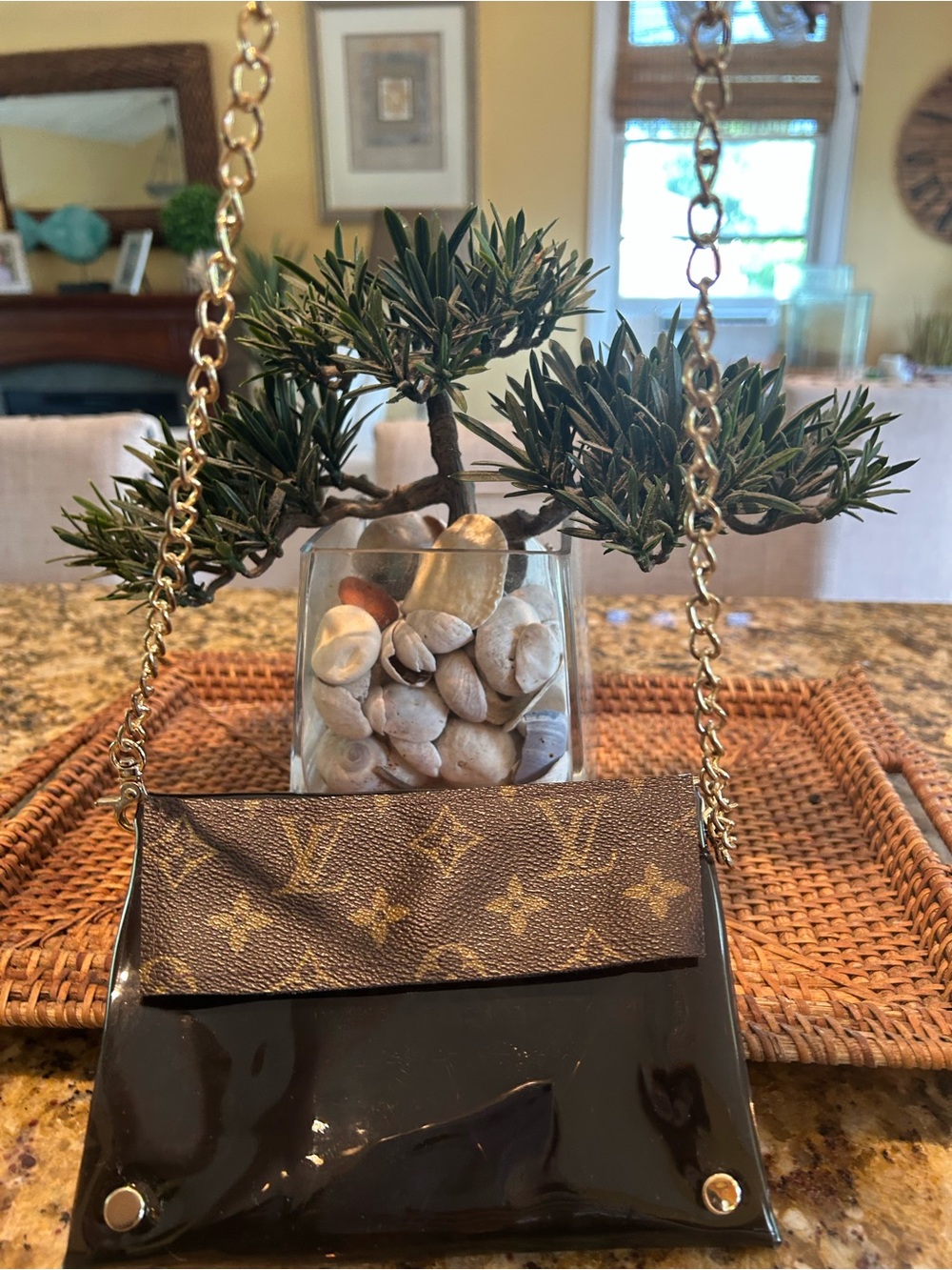 Crossbody with gold chain using authentic Louis Vuitton scraps.